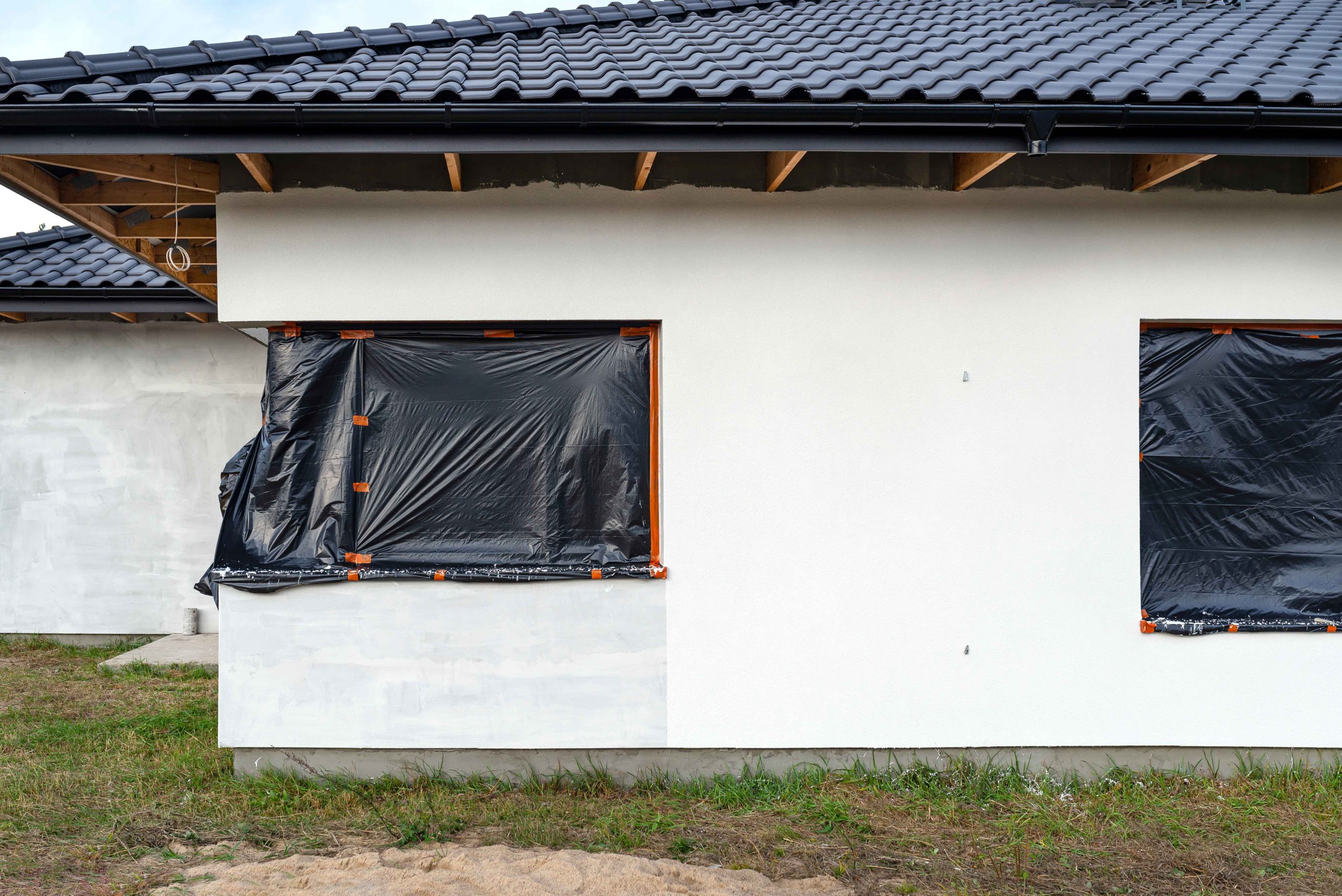 construction-site-home-with-covered-windows-2026-03-24-08-40-44-utc_11zon
