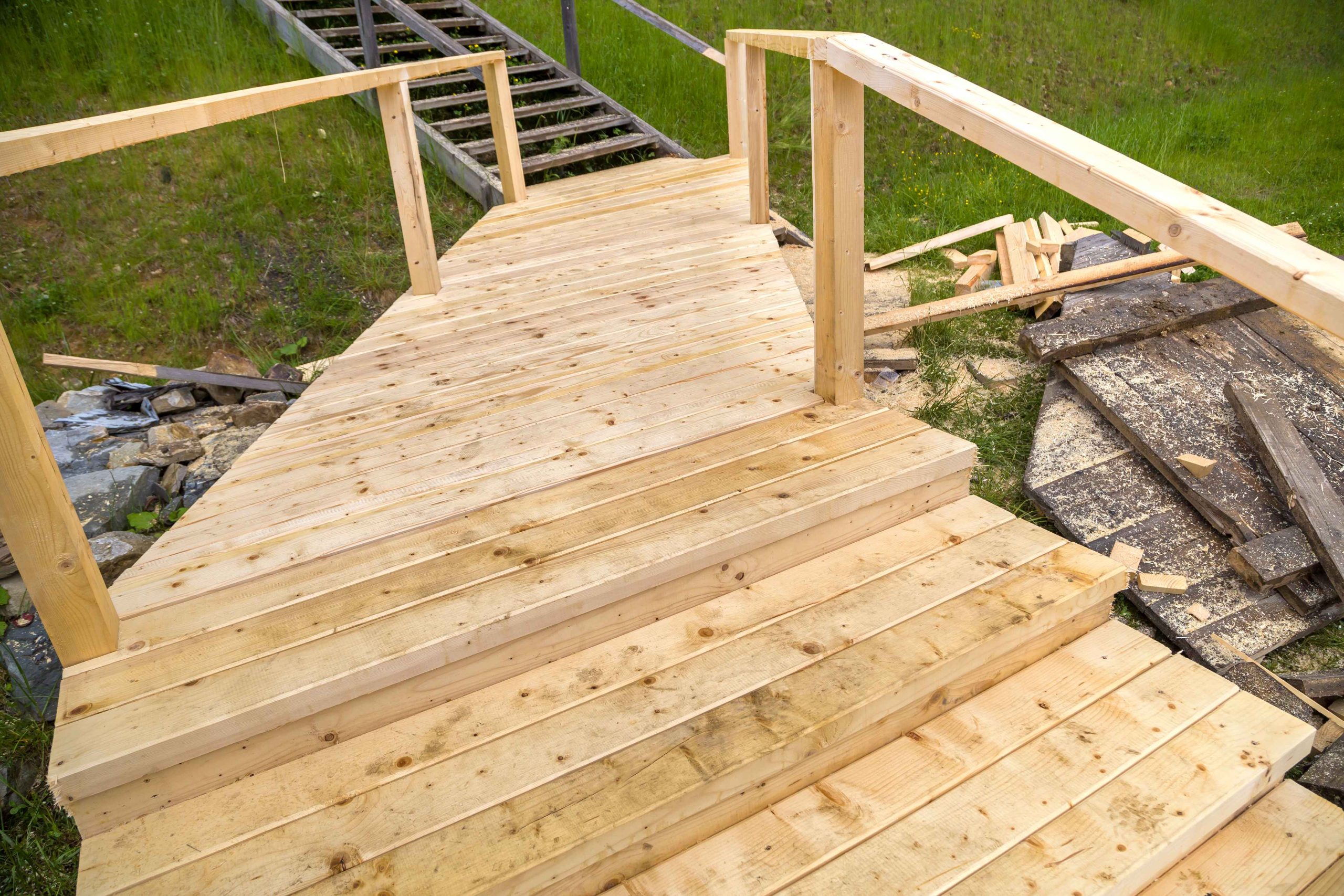new-wooden-walkway-under-construction-in-a-green-a-2026-01-07-00-14-40-utc_11zon